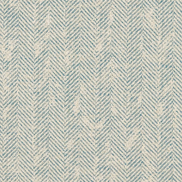 Muted teal and ivory woven chevrons with a softly textured surface