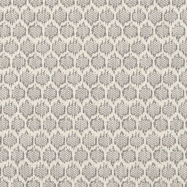 Close-up of Dorset Natural ivory weave with rows of charcoal-grey leaf motifs
