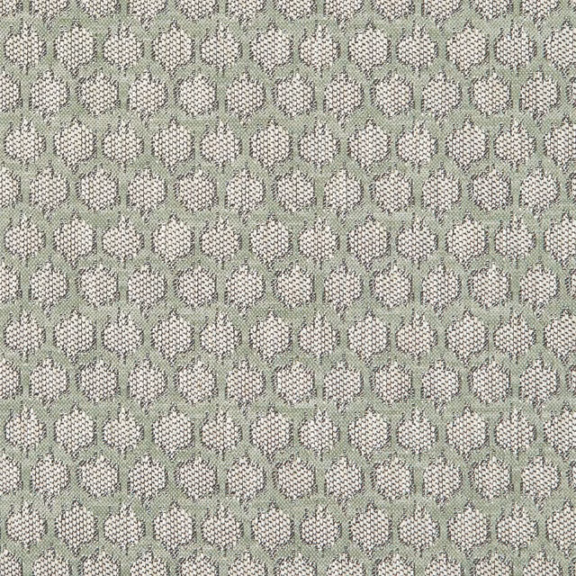Muted sage fabric with small cream oval motifs and dark flecked woven outlines