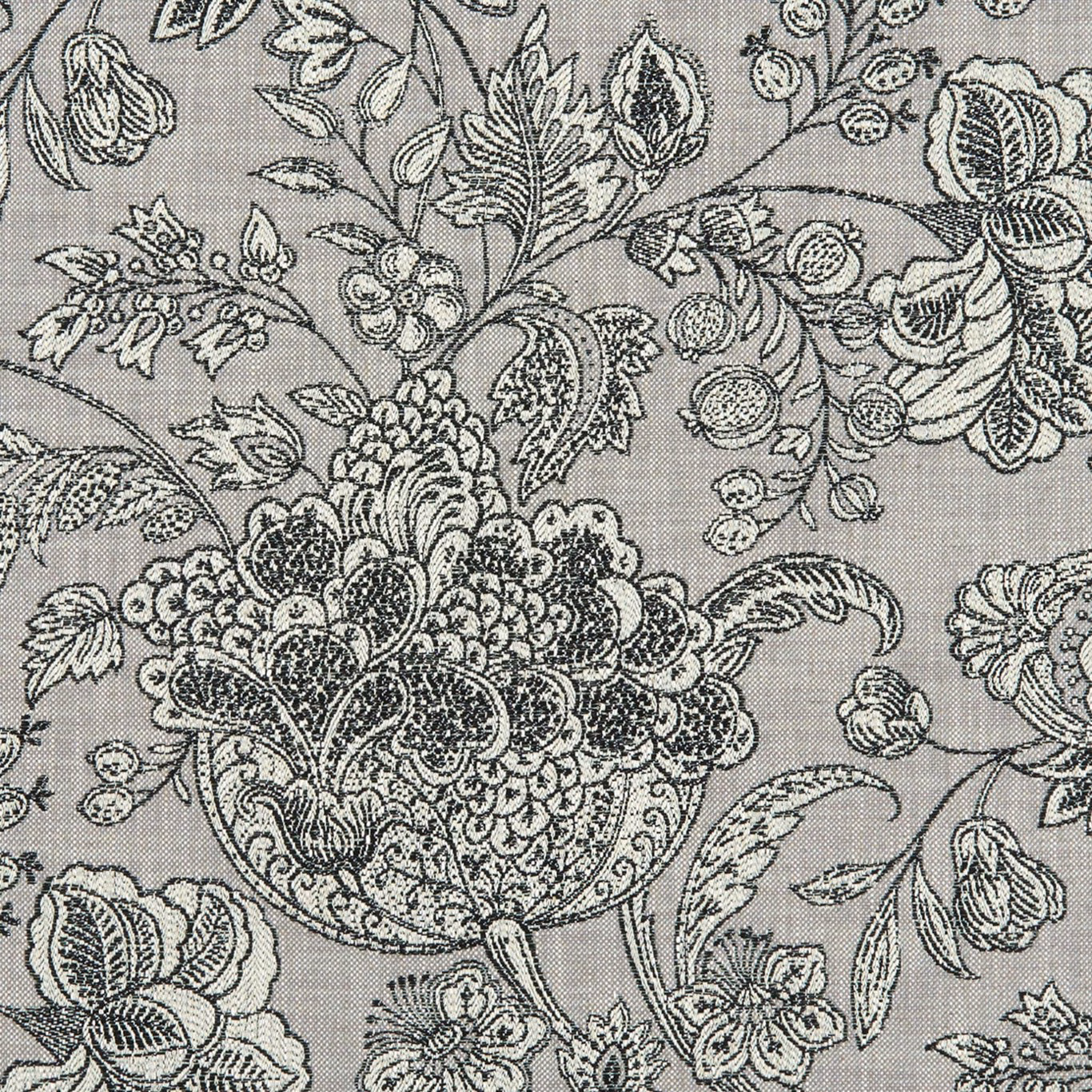 Charcoal grey woven fabric with ornate black botanical florals and paisley motifs