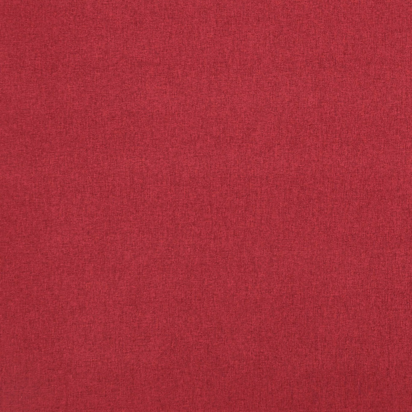 Close-up of deep crimson red woven cloth with subtle vertical slub texture