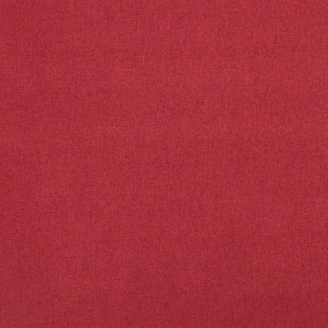 Close-up of deep crimson red woven cloth with subtle vertical slub texture