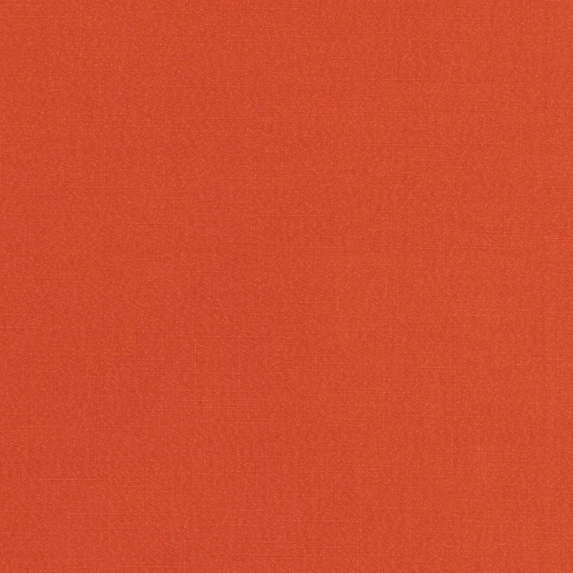 Warm spice-red plain weave with subtle crosshatch texture and softly varied sheen