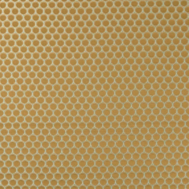 Antique-gold woven fabric with small pale rounded geometric motifs and tactile texture