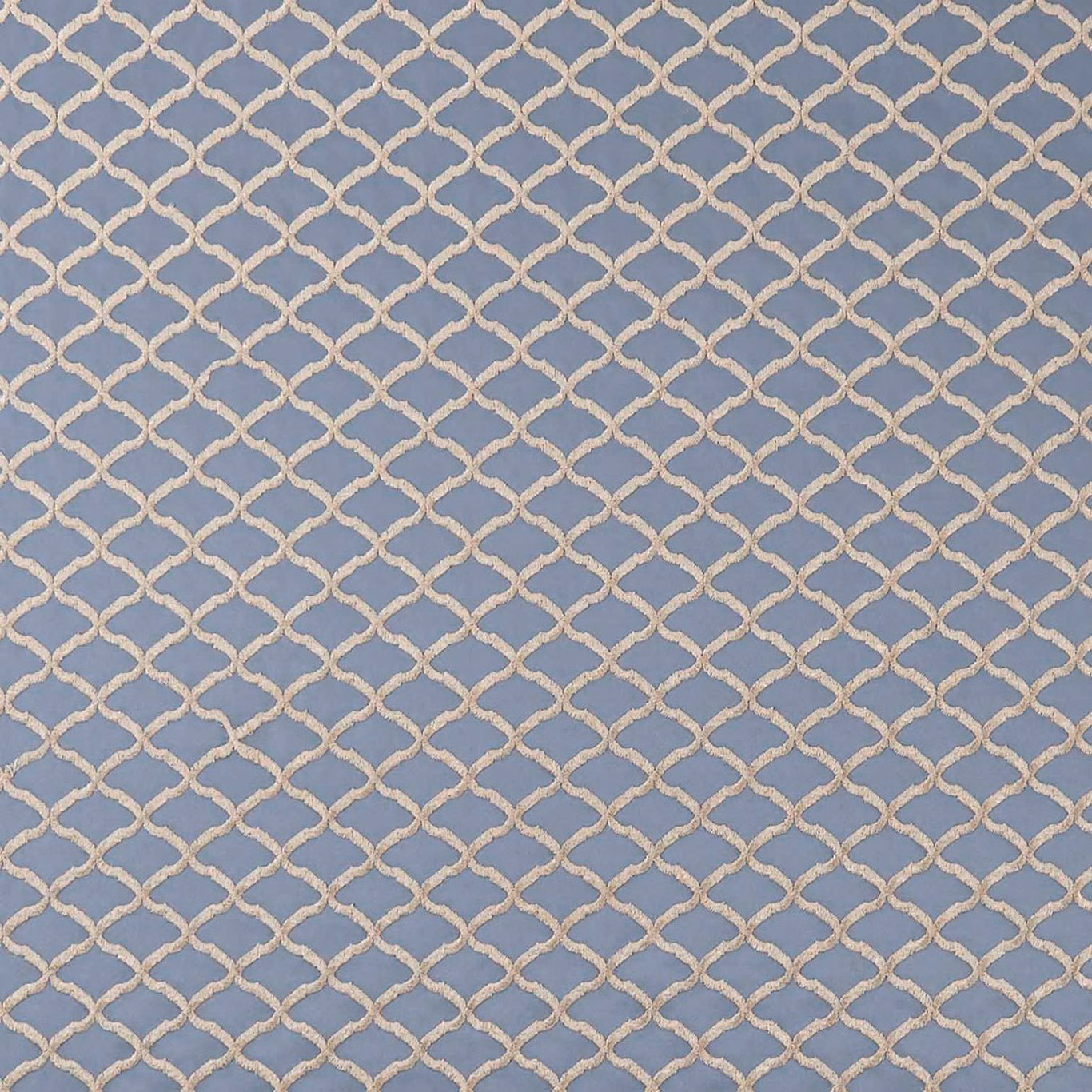 Muted chicory-blue fabric with ivory interlocking trellis and softly textured weave