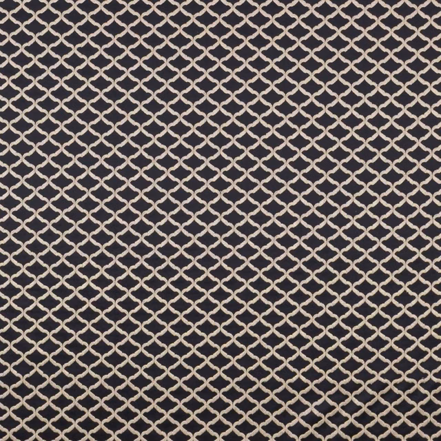 Ebony-black woven ground with a small ivory interlocking lattice and softly textured surface