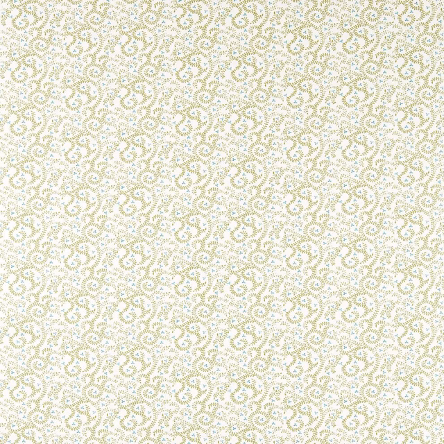 Pale apple-green paisleys and tiny dots scattered across an ivory textile