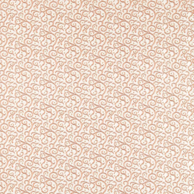 Cream textile with dense terracotta paisley buta embroidery and fine raised texture