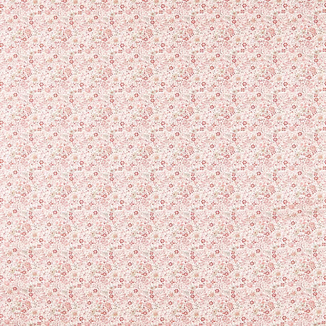 Tiny dusty-rose floral motifs across an ivory-blush woven ground