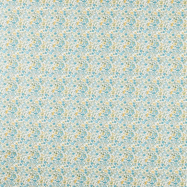 Dense small teal and ochre floral motifs scattered across a warm cream fabric ground