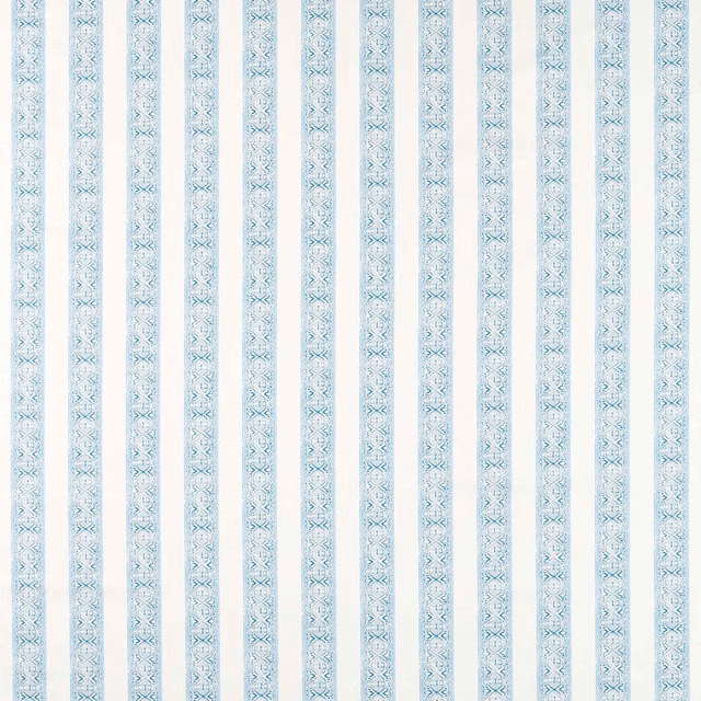 Ivory fabric with slim vertical bands of pale cobalt geometric motifs
