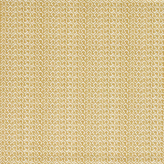 Antique gold fabric with cream interlocking geometric motifs and fine woven texture