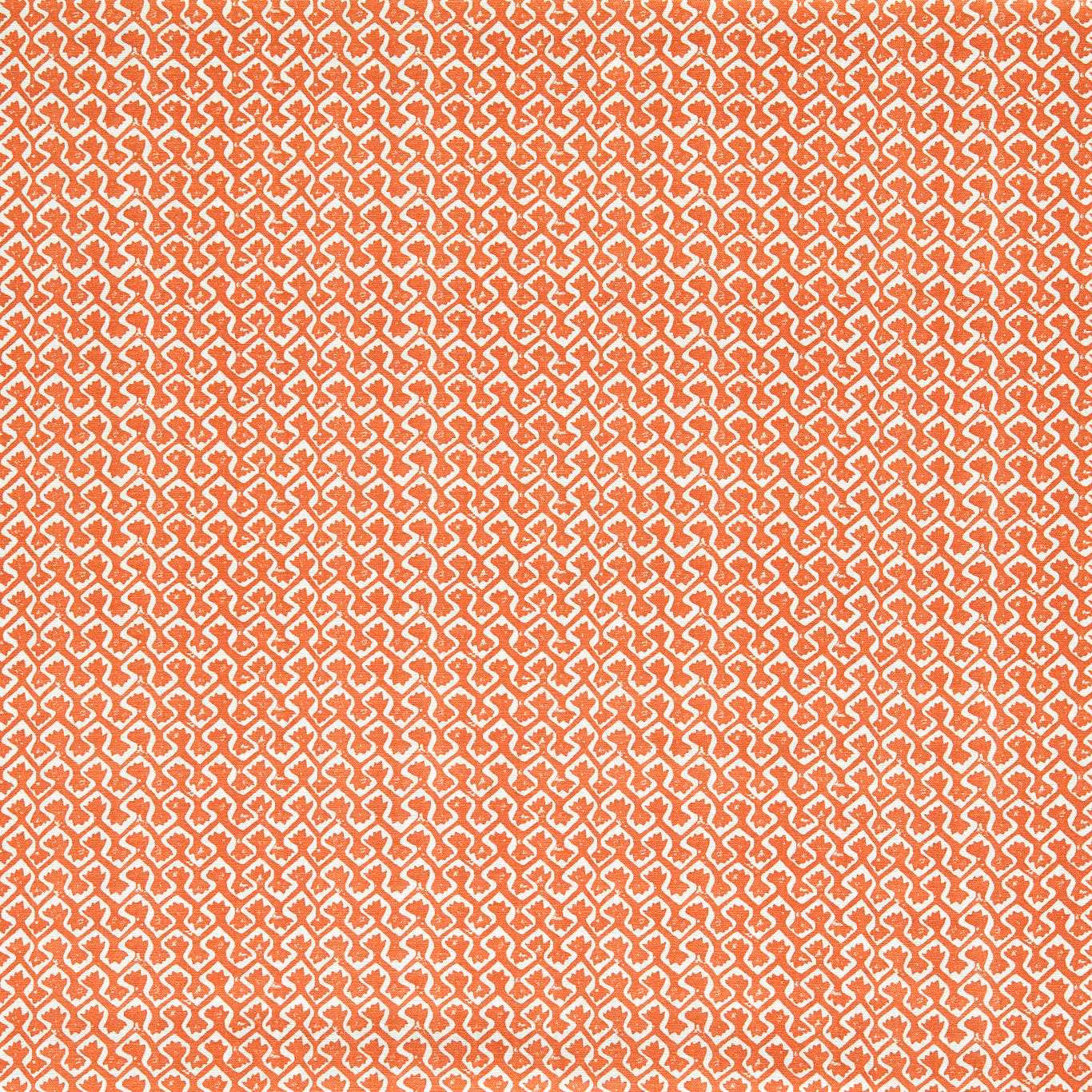 Warm spice terracotta fabric with a dense cream interlocking geometric weave