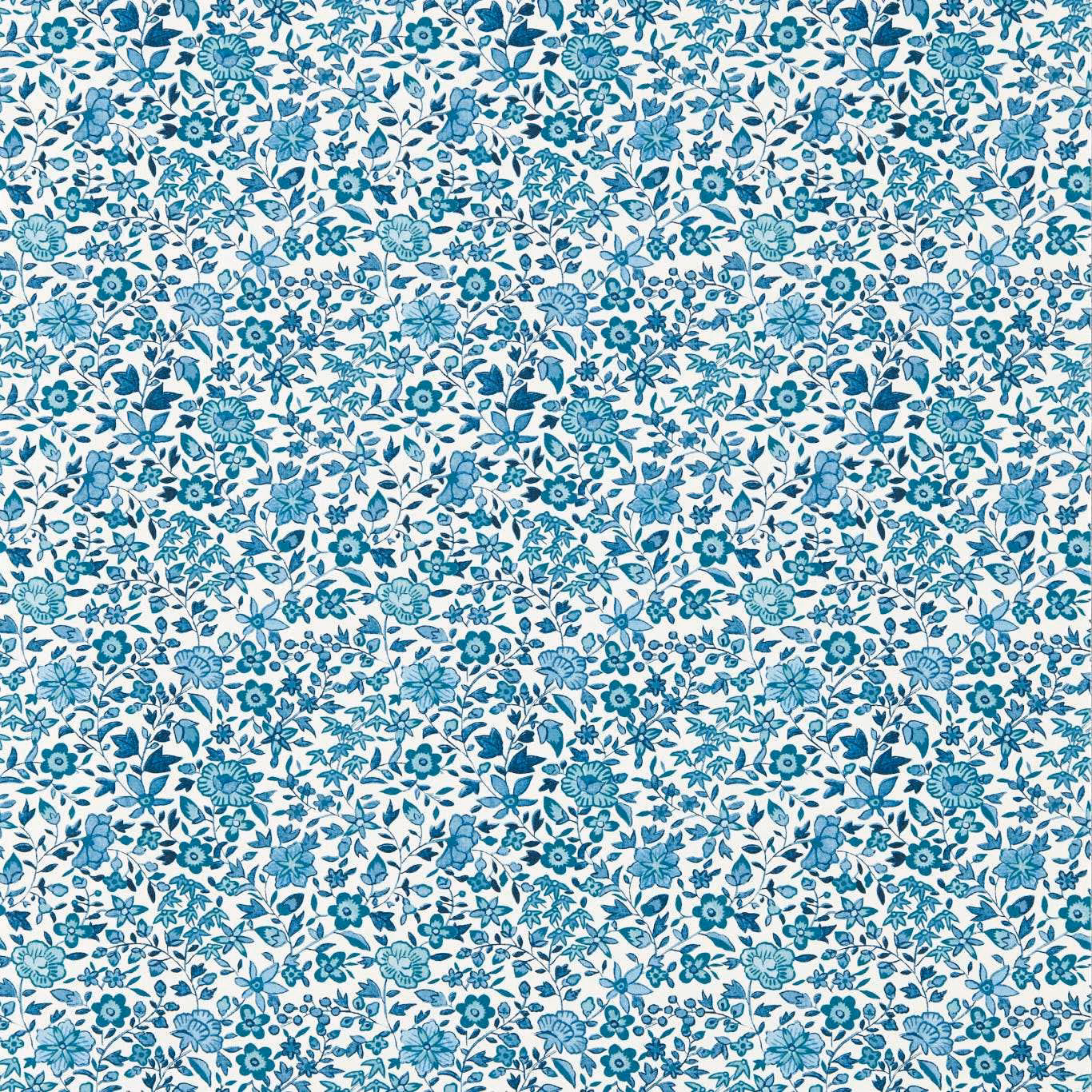 Dense cobalt and teal floral sprigs scattered across a pale wallpaper ground