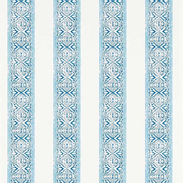 Cobalt blue scrolling floral wallpaper bands on an icy white ground