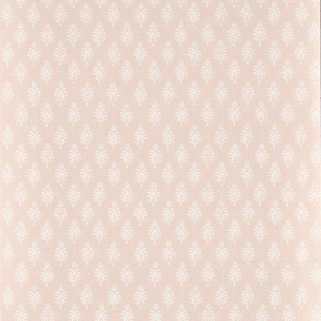 Warm blush-pink wallpaper with small ivory botanical sprigs in a repeating grid