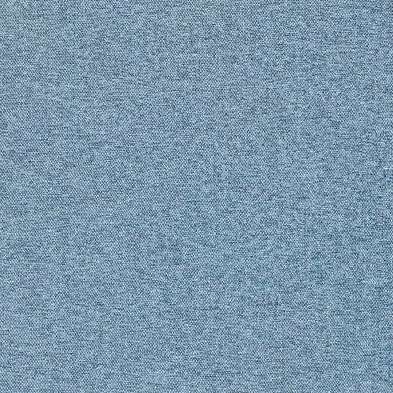 Close-up of muted blue-teal chenille with a fine, even woven texture