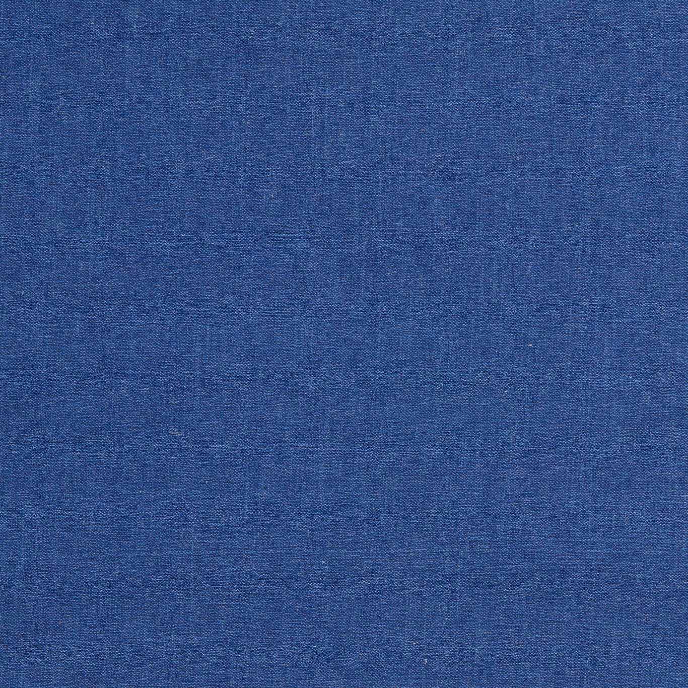 Close-up of saturated cobalt-blue chenille with a fine, softly variegated woven texture