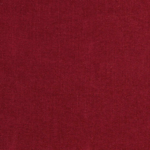 Close-up of deep ruby red chenille with subtle burgundy tonal variation and fine woven texture