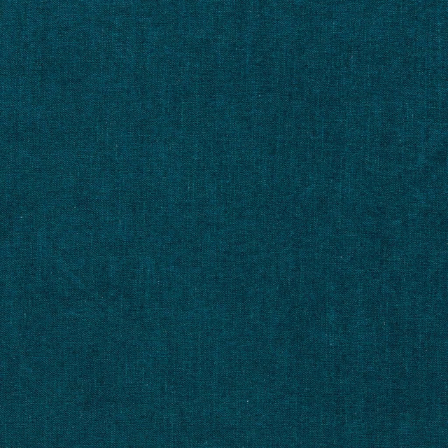 Close-up of deep teal chenille with fine, softly mottled woven texture