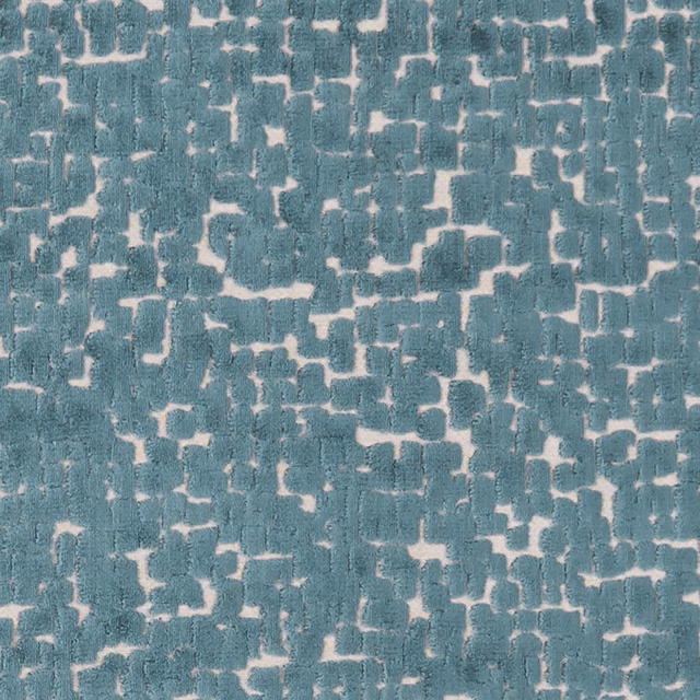 Cool mineral teal woven fabric with pale blush broken geometric maze texture