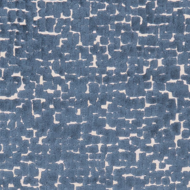 Textured muted navy fabric with irregular ivory geometric breaks and woven striations