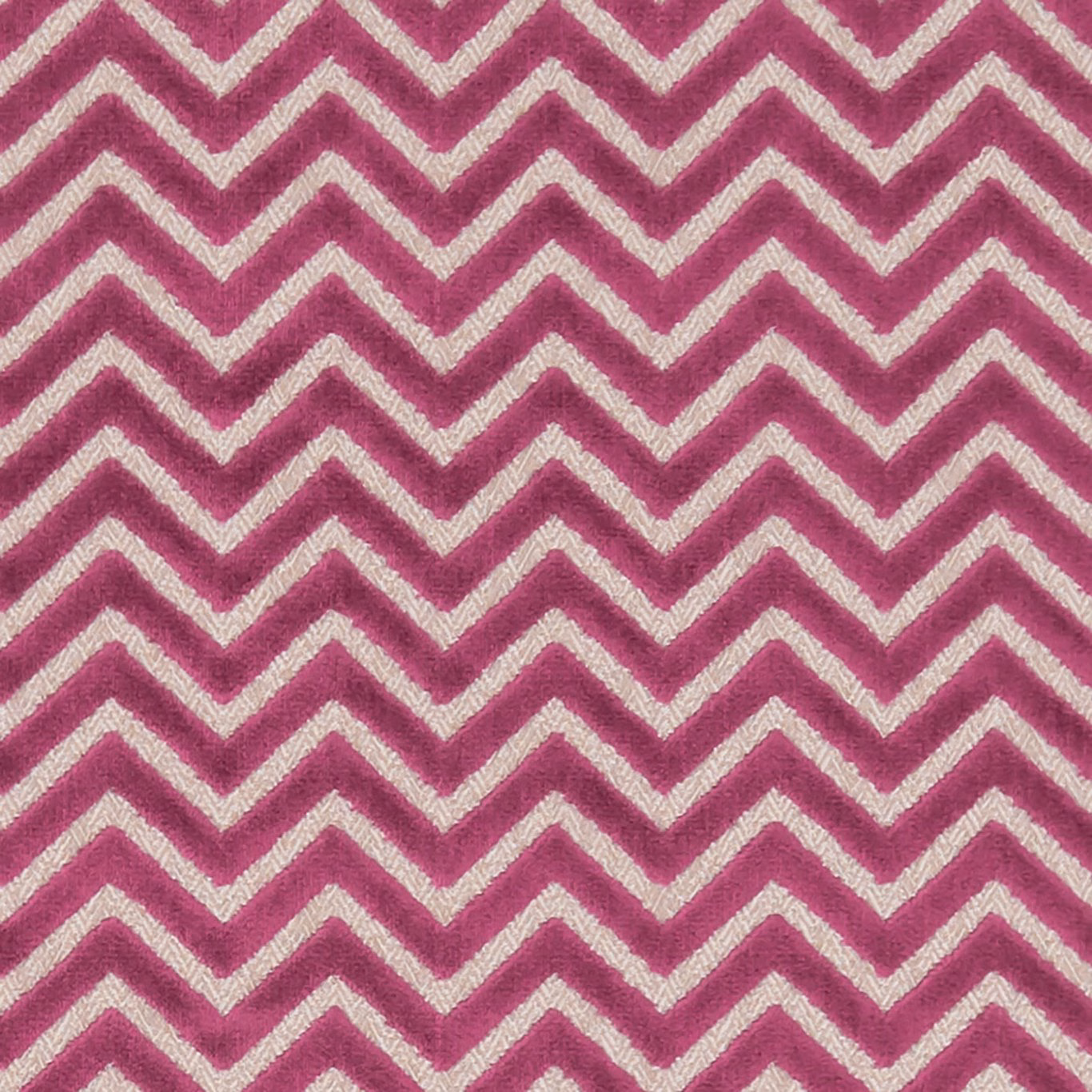 Saturated fuchsia and ivory chevrons in a softly textured woven surface