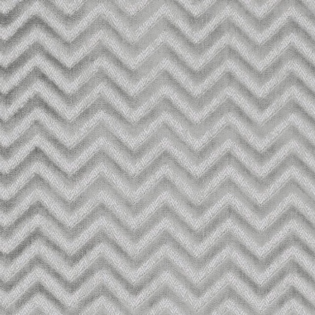 Cool slate grey woven fabric with fine repeating chevron bands and flecked texture