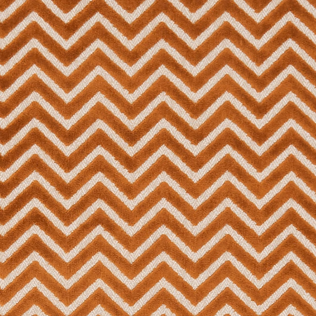 Burnt spice-orange woven chevrons alternating with ivory on a nubby textile ground