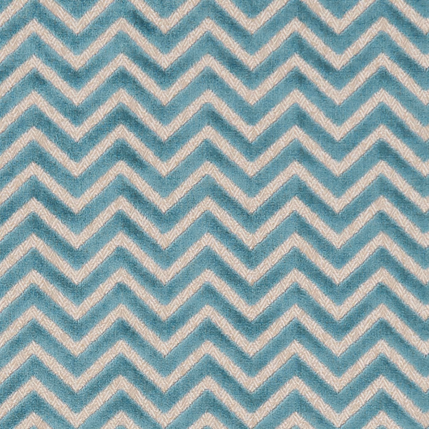 Cool teal and ivory zigzag chevrons reveal a softly textured woven surface