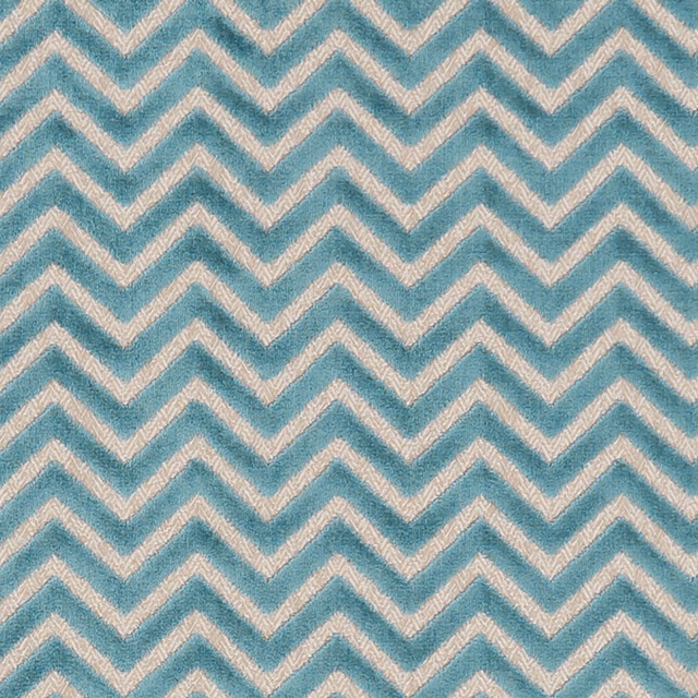 Cool teal and ivory zigzag chevrons reveal a softly textured woven surface