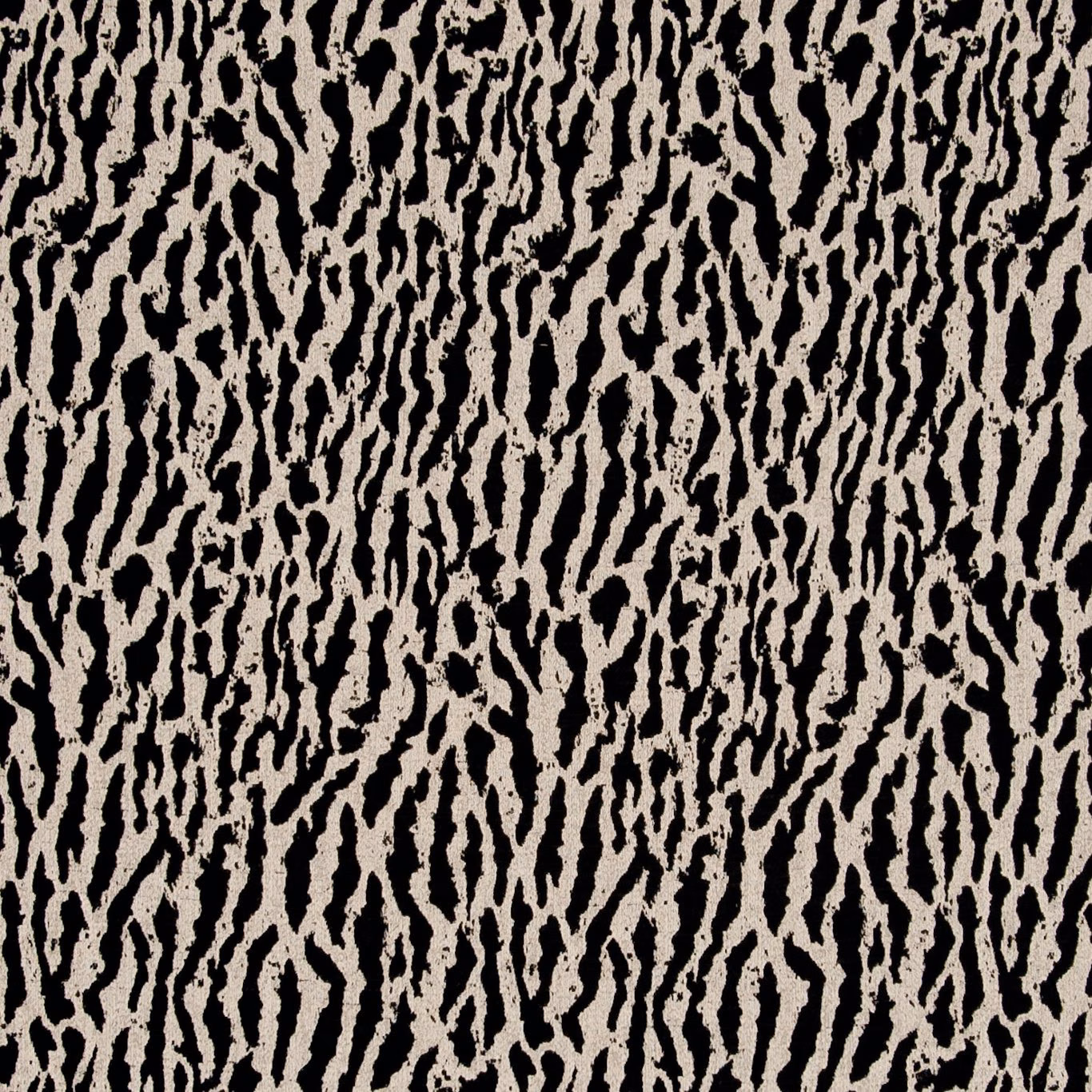 Near-black charcoal fabric with warm stone, irregular vertical animal-stripe texture