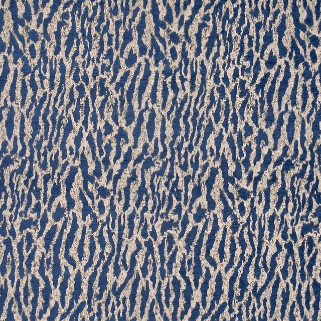 Deep indigo woven upholstery fabric with irregular oatmeal vertical striations and tactile texture