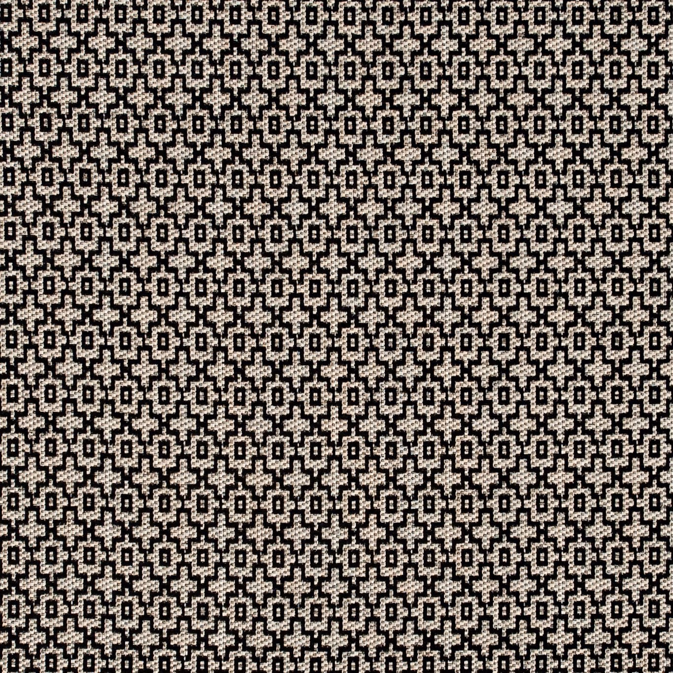 Dense charcoal and ivory geometric woven fabric with tiny stepped motifs