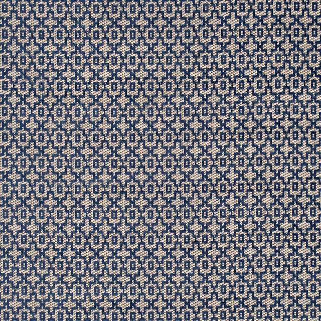 Dense indigo and cream geometric weave with a tactile, flecked surface