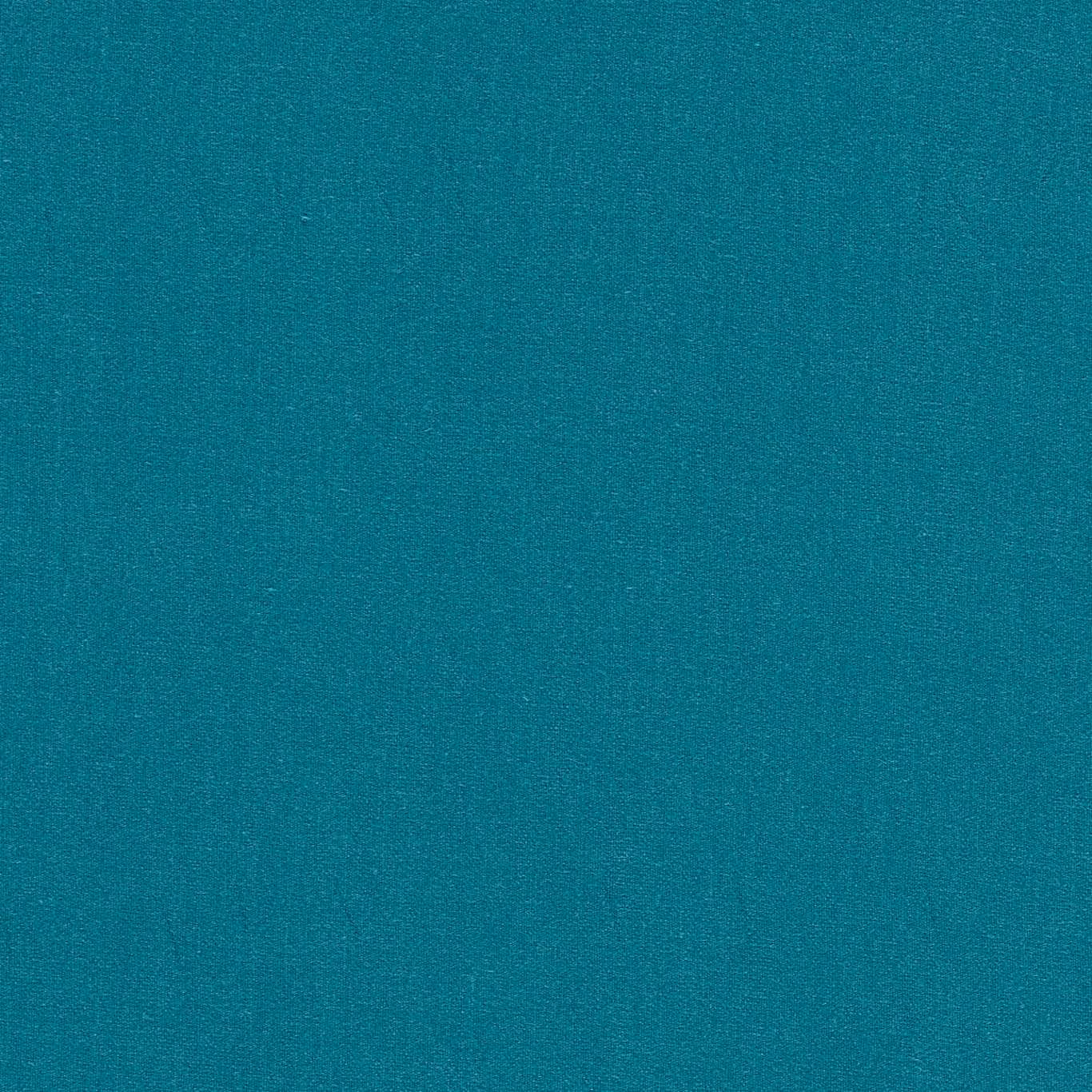 Close-up of saturated kingfisher teal fabric with a fine, subtly mottled weave