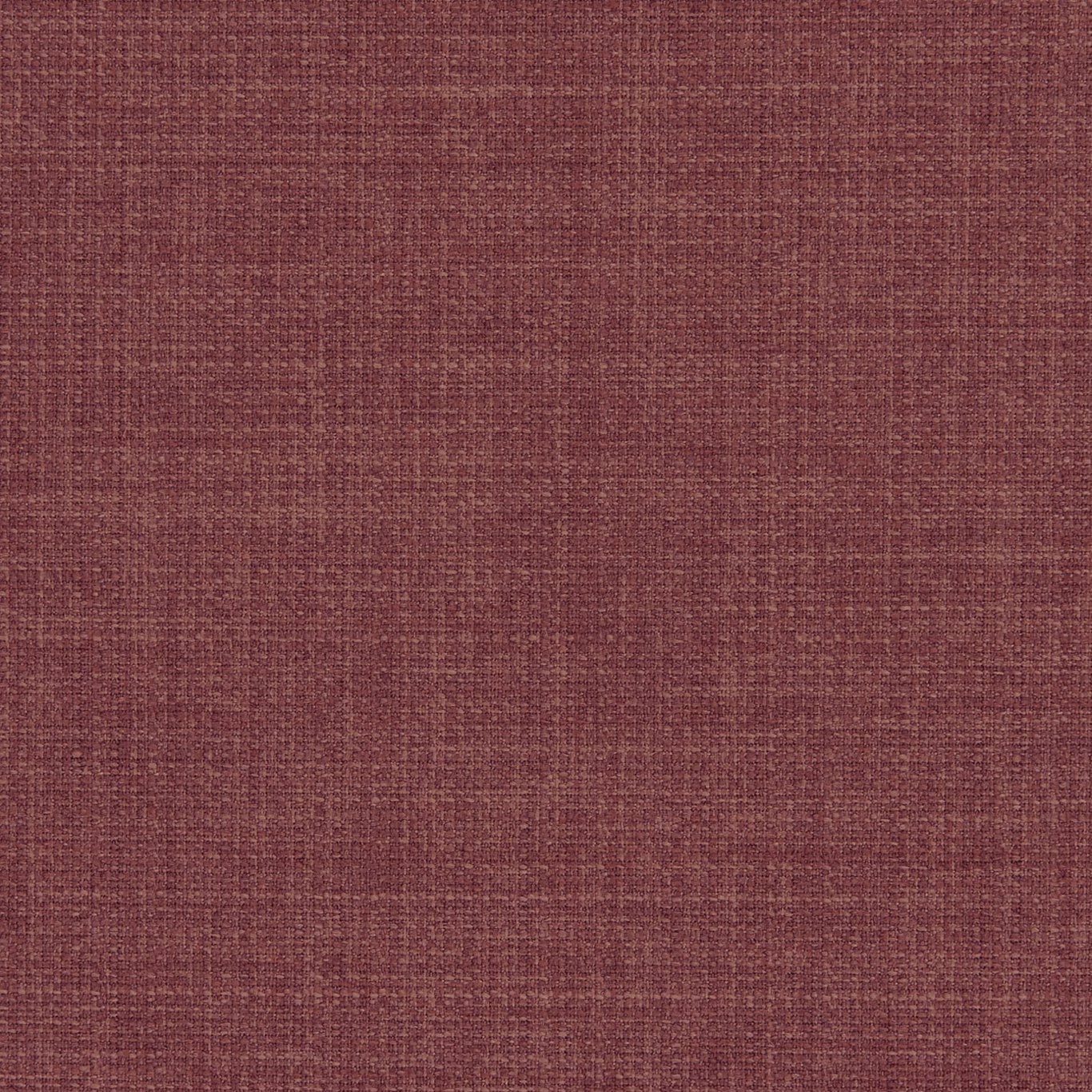 Close-up of muted henna red woven fabric with fine crosshatched slub texture