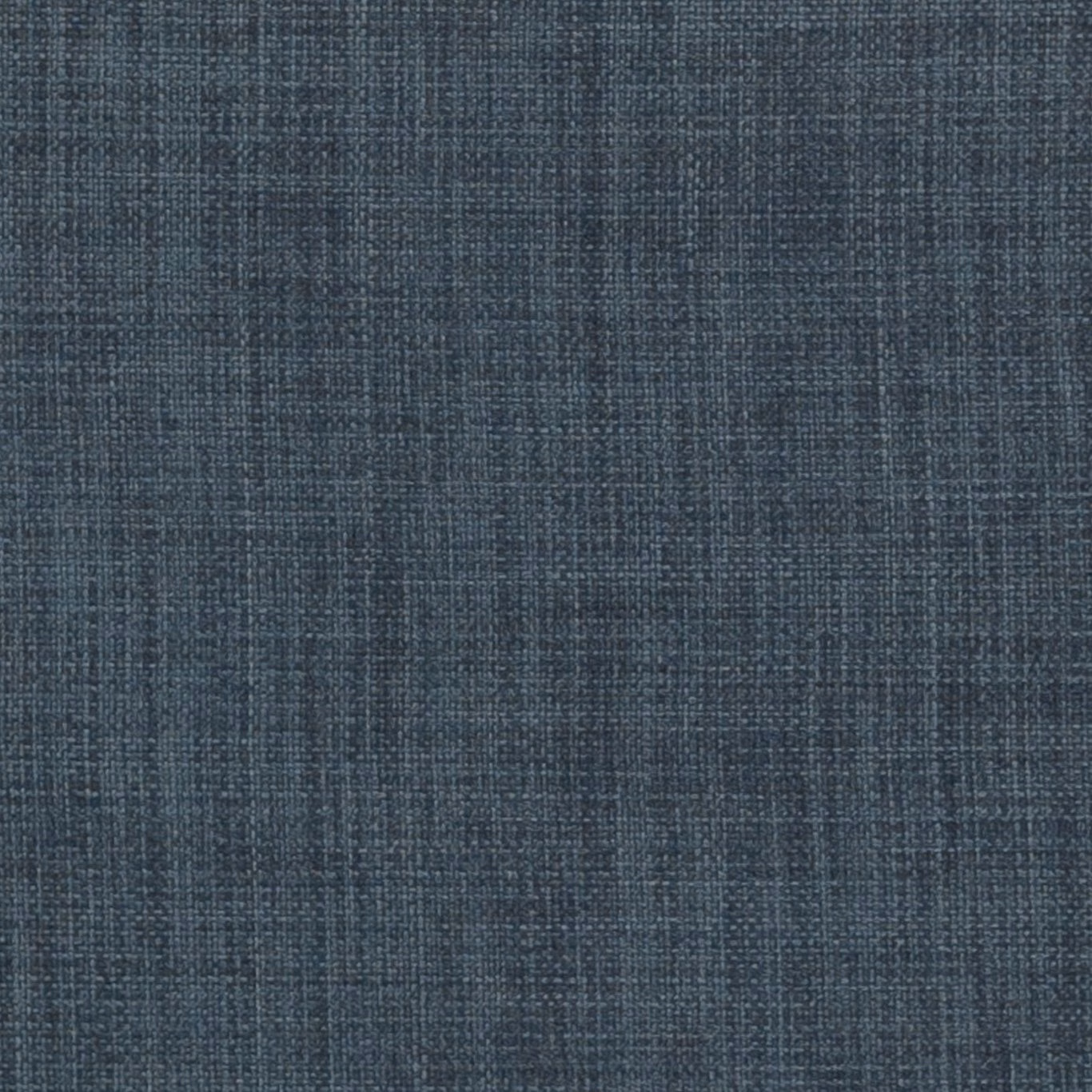 Close-up of deep indigo-blue woven fabric with fine crosshatched texture and vertical striations