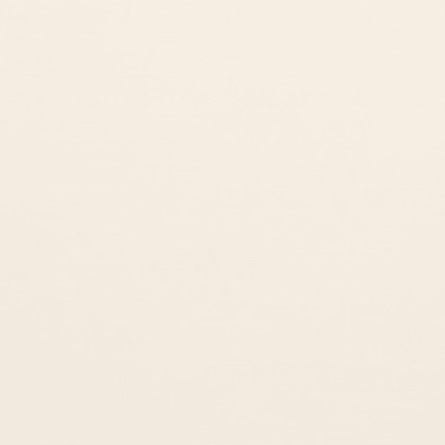 Close-up of warm ivory cream plain weave with a softly matte surface