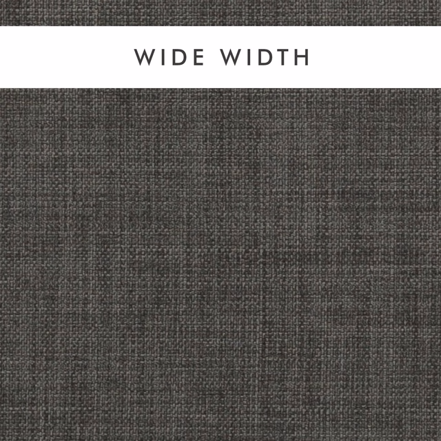 Close-up of dark graphite grey fabric with a softly irregular woven texture