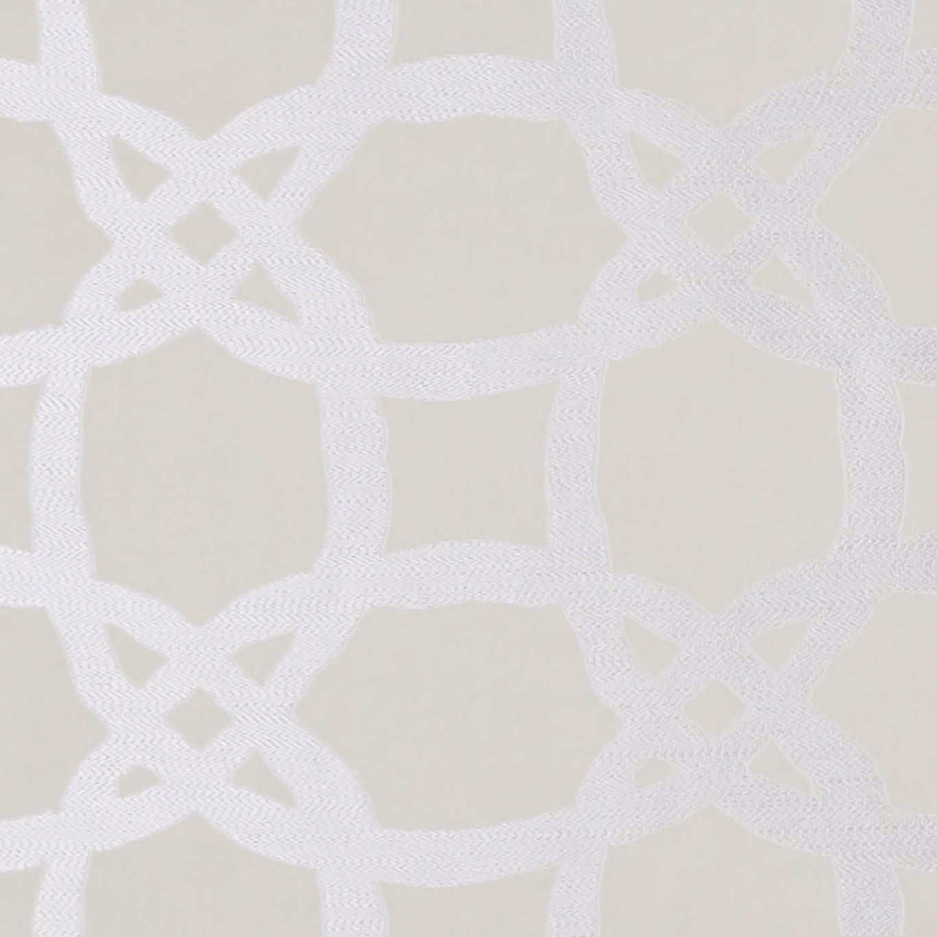 Pale champagne textile with white interlocking geometric bands and fine woven texture