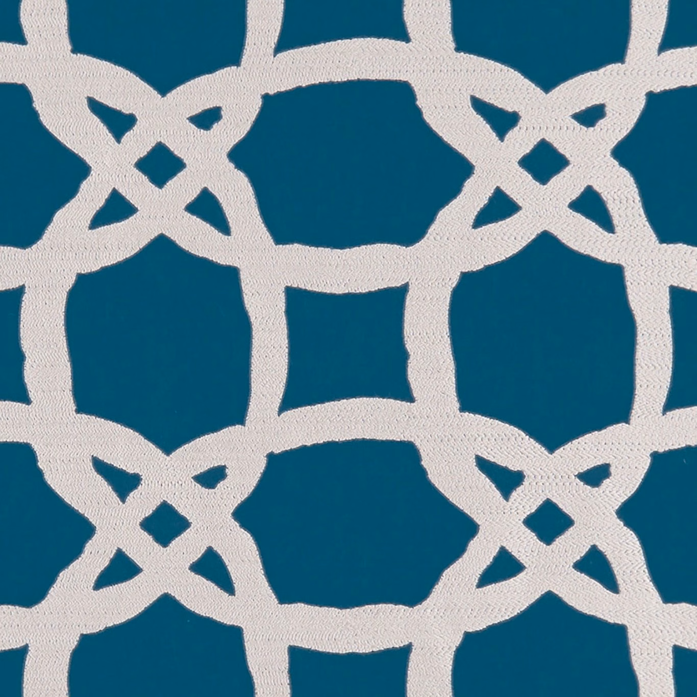 Deep kingfisher teal woven ground with an ivory interlocking lattice motif