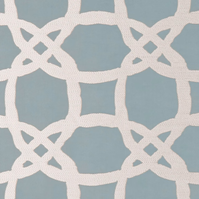 Cool blue-grey woven fabric with ivory interlocking lattice and diamond details