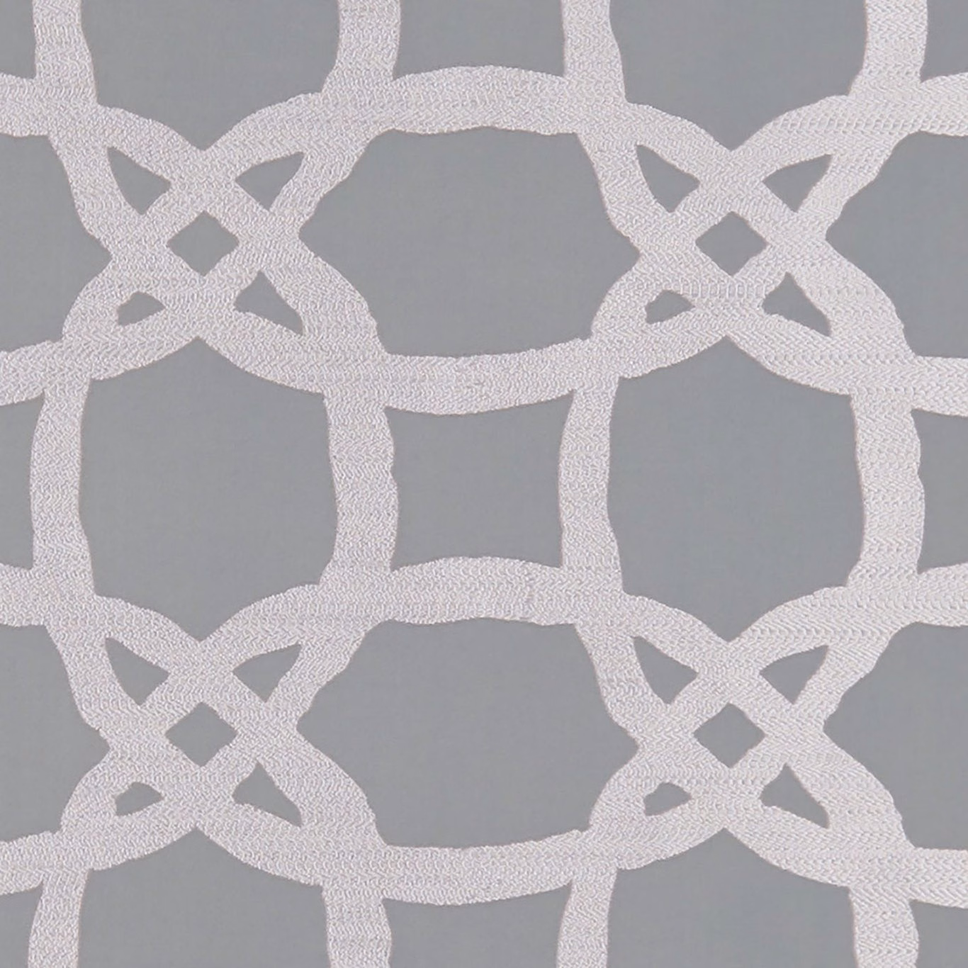 Cool pewter grey textile with a textured ivory interlocking lattice motif