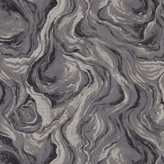 Charcoal and silver-grey fabric with swirling marbled woven forms and dark graphite accents