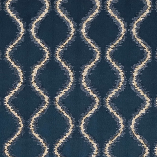 Deep midnight-blue textile with cream wavy lattice lines and soft woven texture