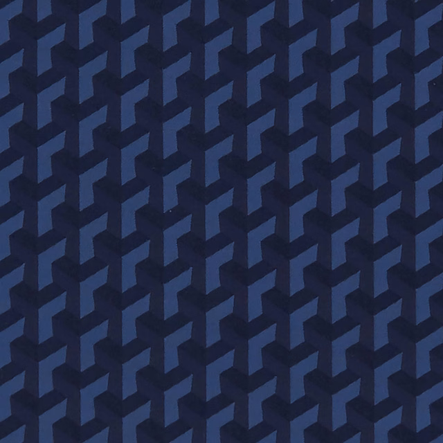 Midnight navy upholstery fabric with a small interlocking blue geometric weave