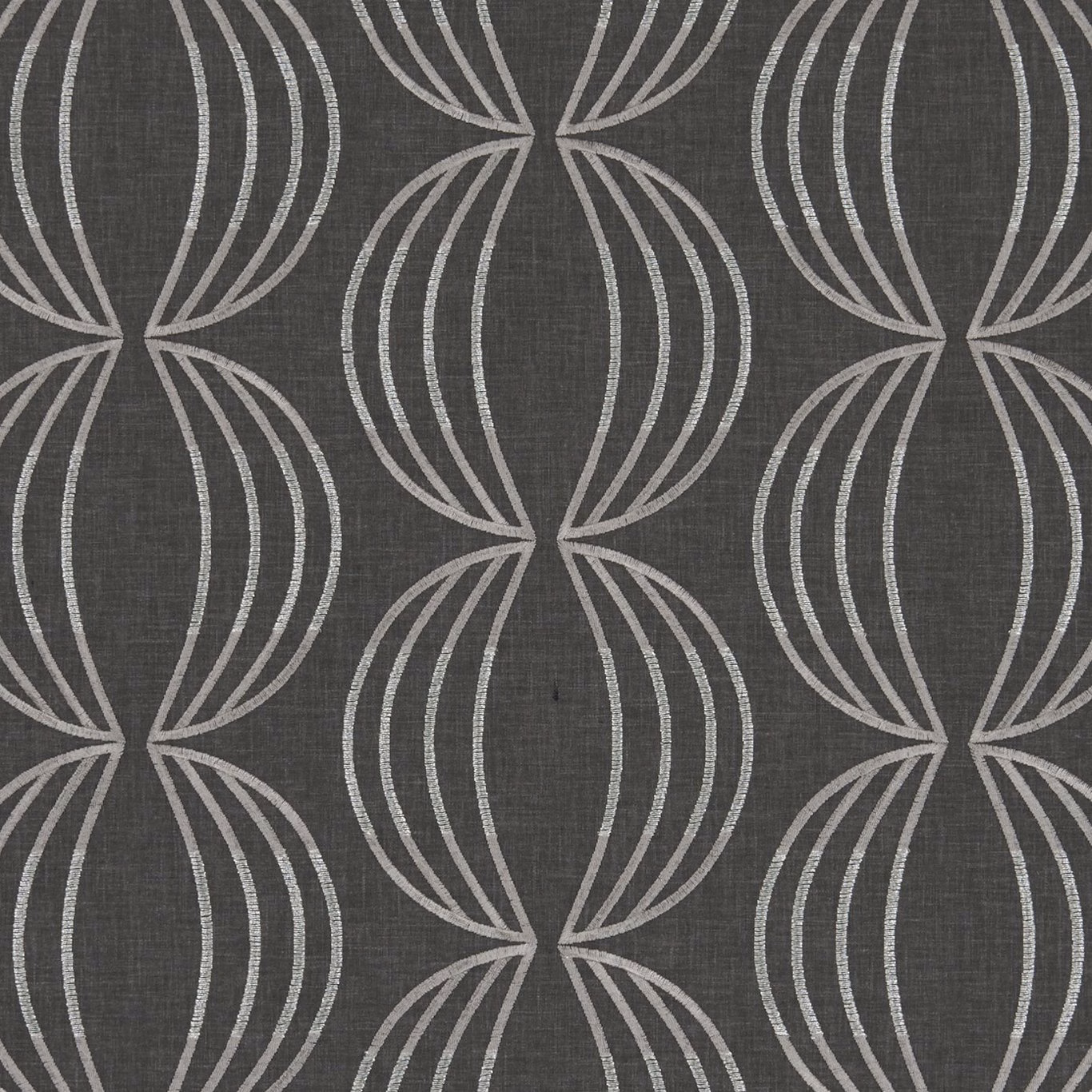 Charcoal woven fabric with pale dusty rose looping oval line motifs