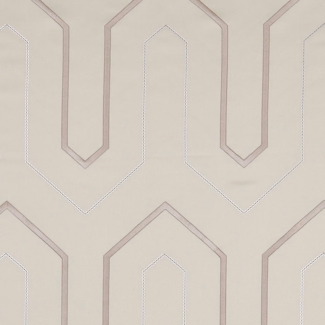 Ivory geometric fabric with taupe angular outlines and fine dotted inner motifs