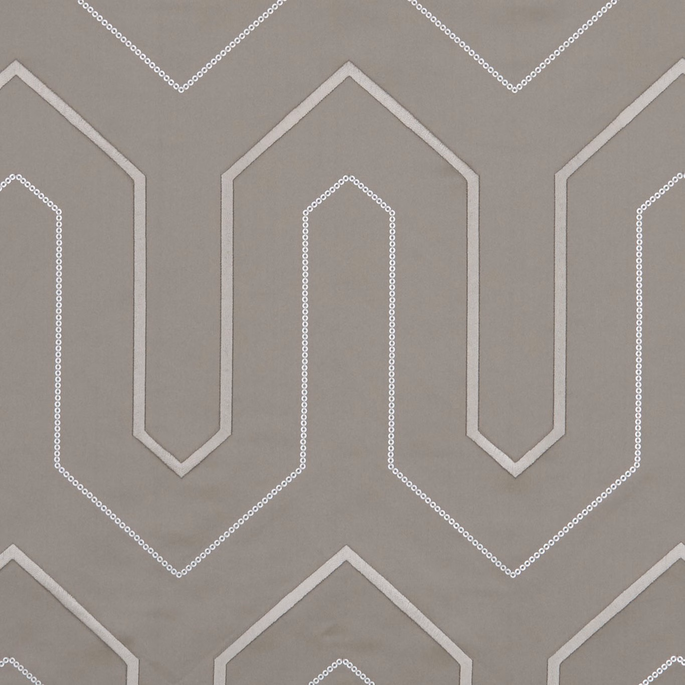 Warm mocha taupe fabric with ivory angular arches and delicate dotted outlines
